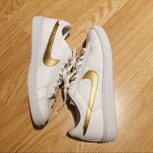 NIKE white and gold shoes